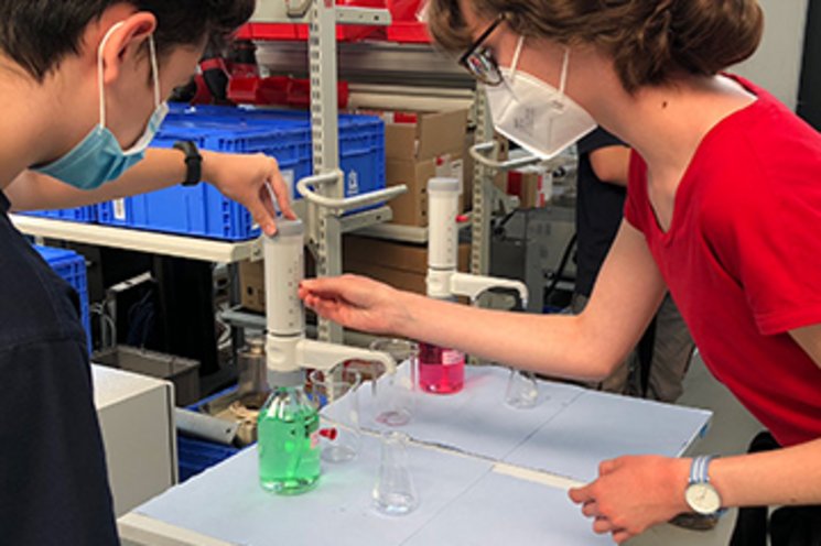 Two apprentice during work