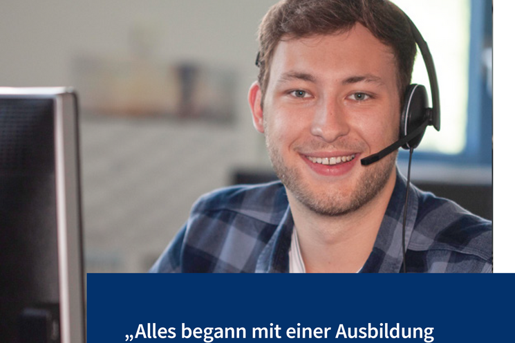 Employee smiles into the camera