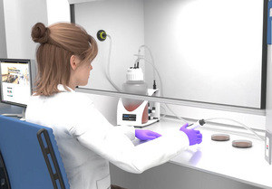 Scientist working with a BVC fluid aspiration system