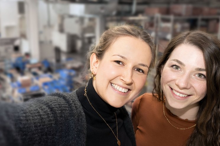 Two employees making a selfie