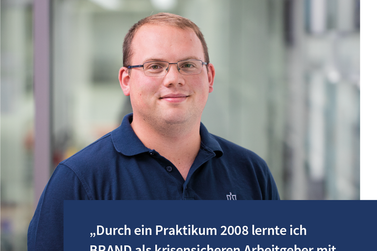 Employee looks into the camera